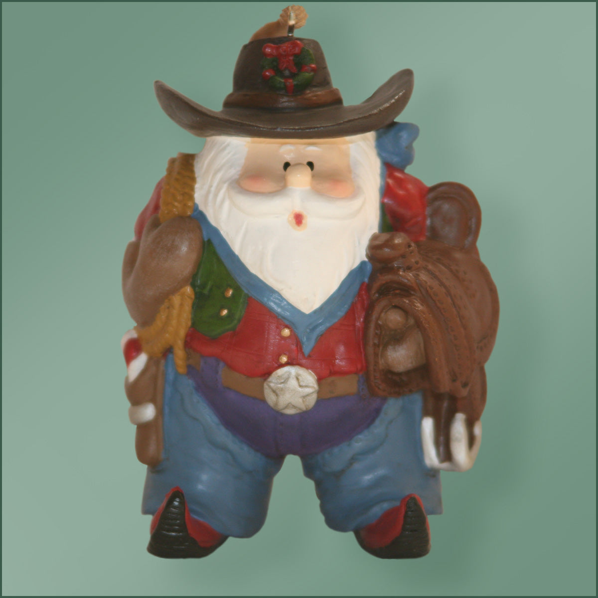 Polyresin - Santa with Saddle And Lariat